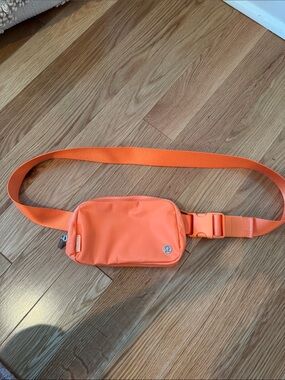 lululemon bright orange waist pack